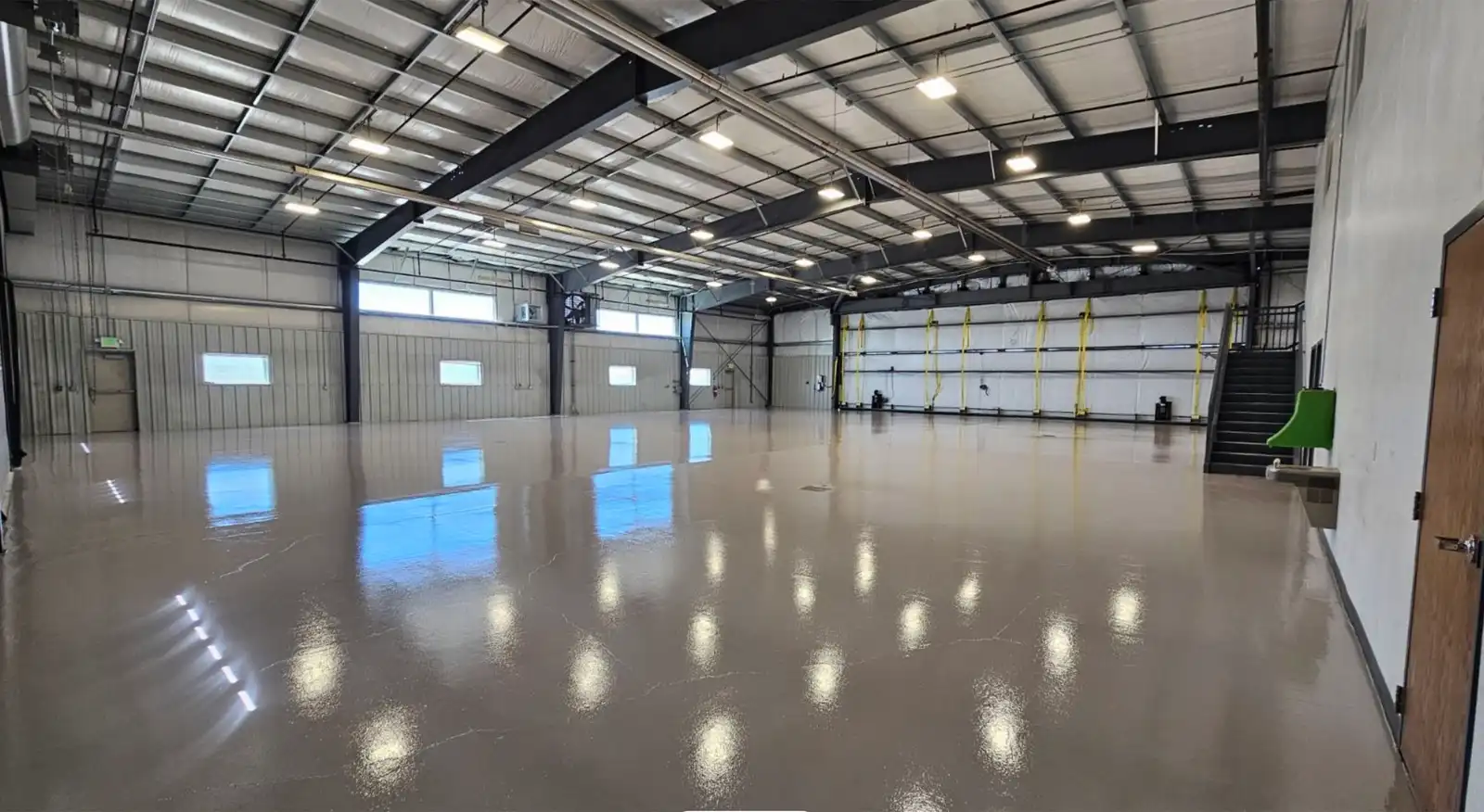 Empty TCA hangar at RKS with polished floor